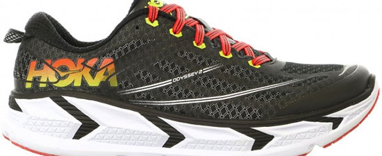 Hoka running shoe with black mesh upper, red laces, and white sole, featured in a guide on breaking in new running shoes for foot health.